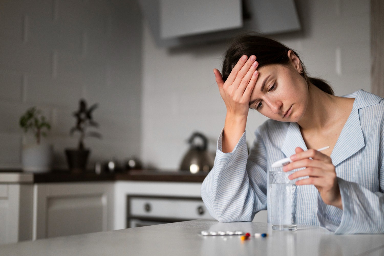 girl worried holding medicines
