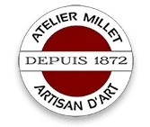 Logo circulaire Atelier Millet Artisan d’Art, avec la mention « Depuis 1872 ».