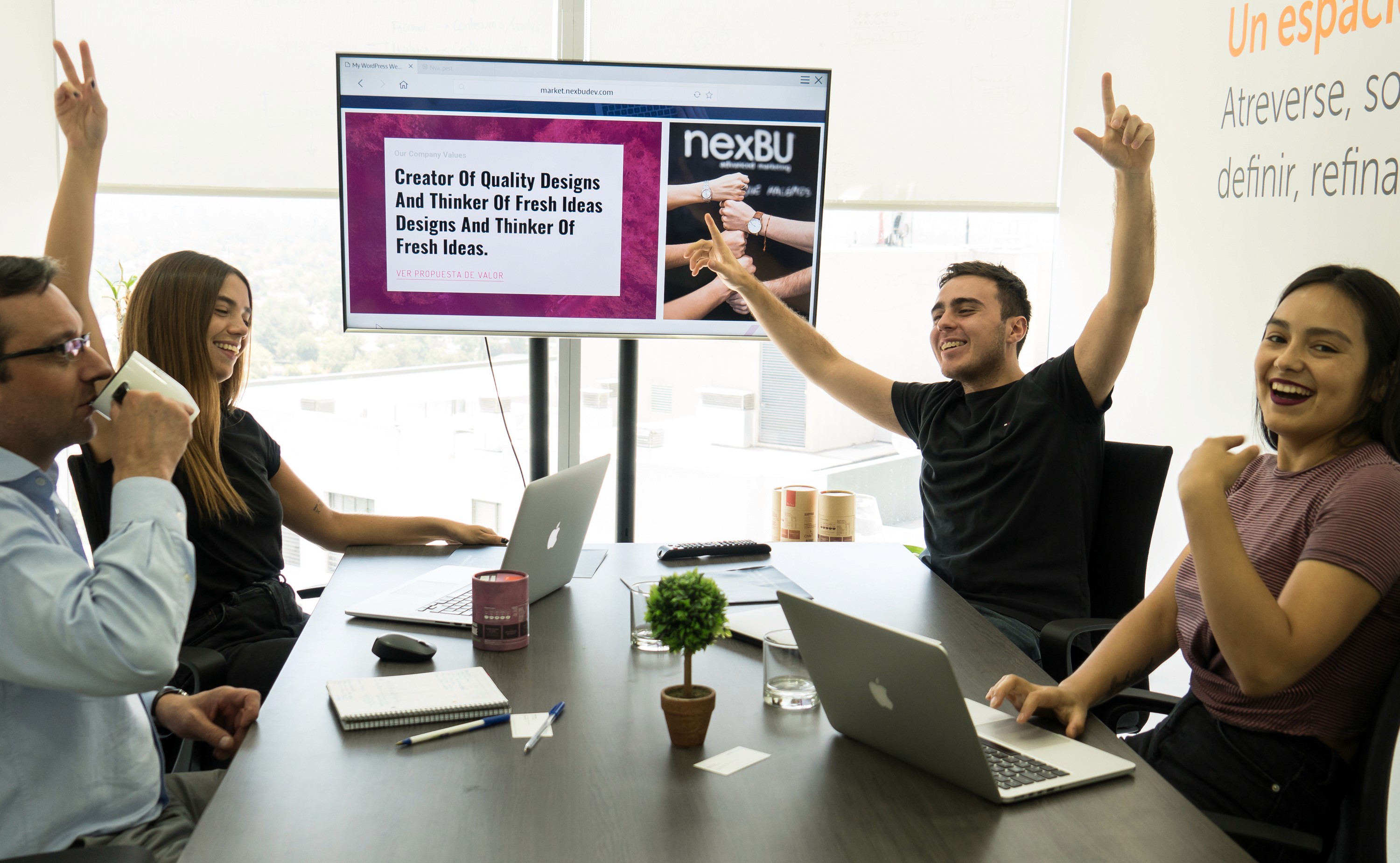 A work team around the desk