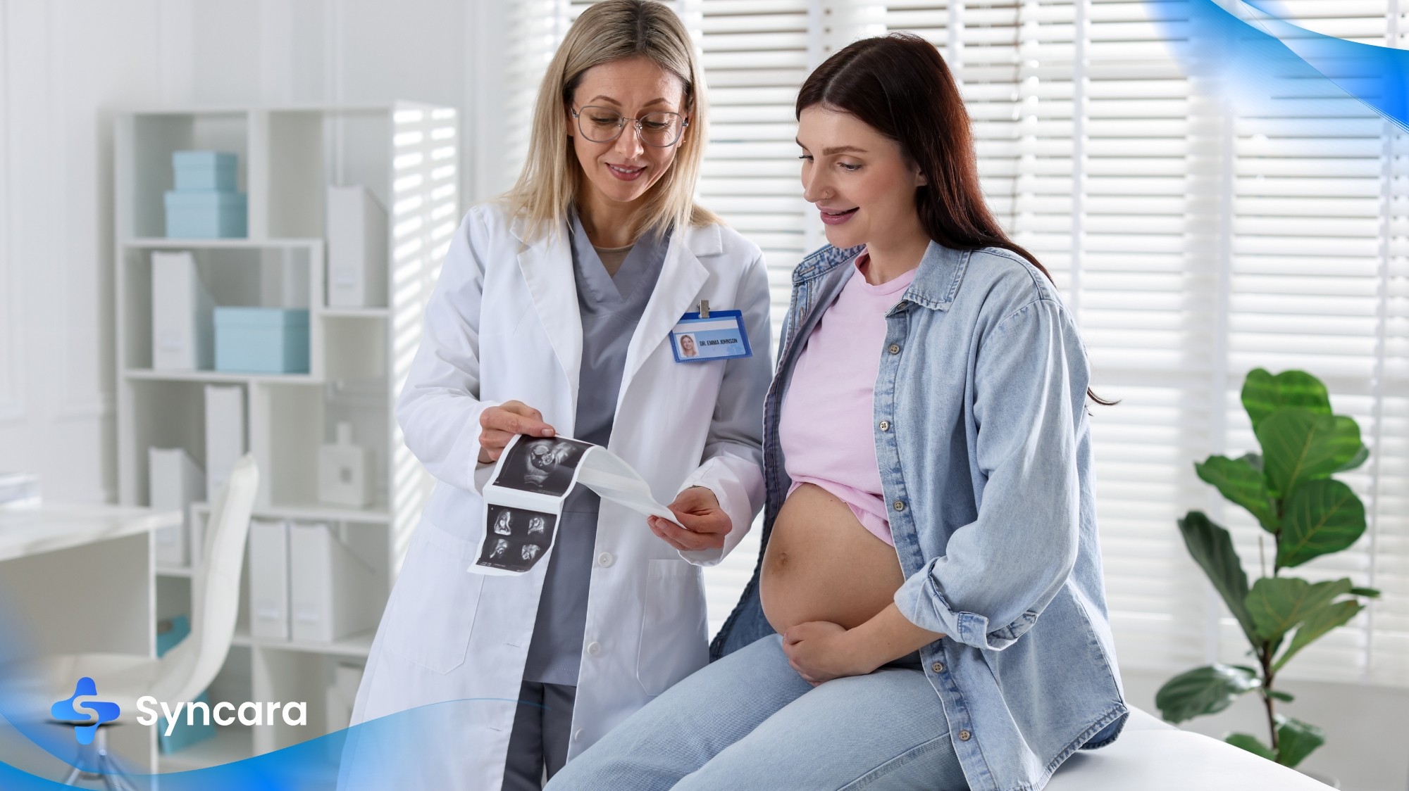 Pregnant woman talking with her doctor during a prenatal checkup.