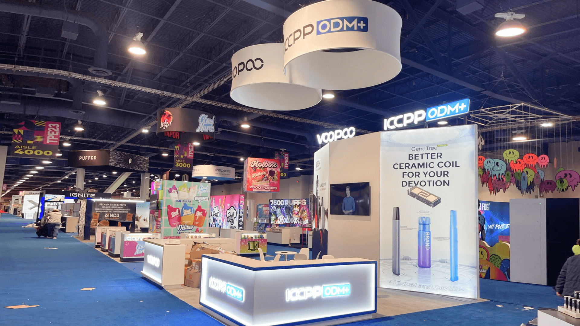 20x20 booth design review with demo area, meeting zone, graphics, storage, power access, and flooring plan