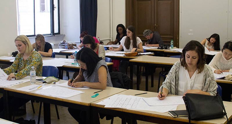 Students working on lettering exercise