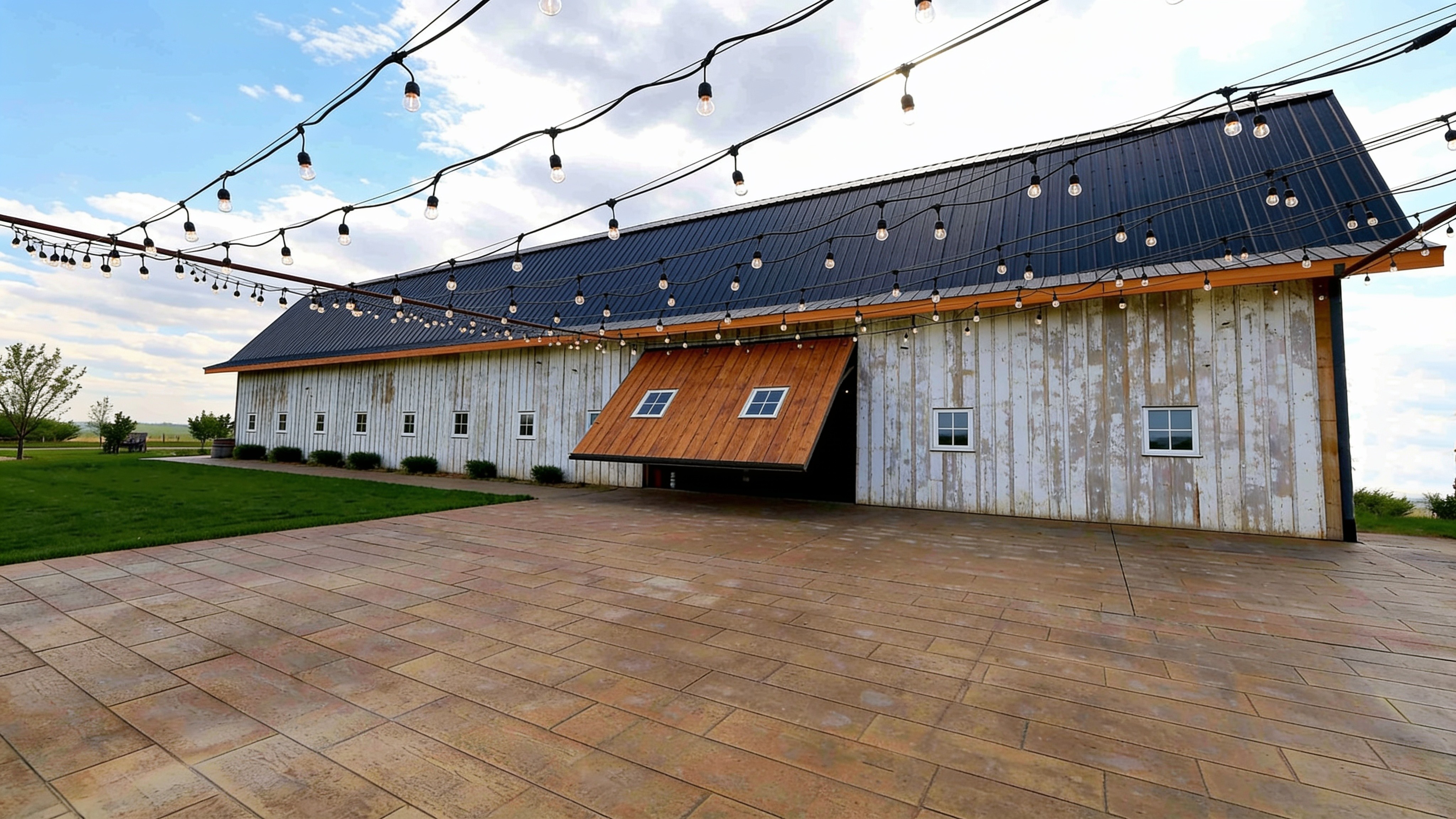 Restored dairy barn events venue with a PowerLift commercial door