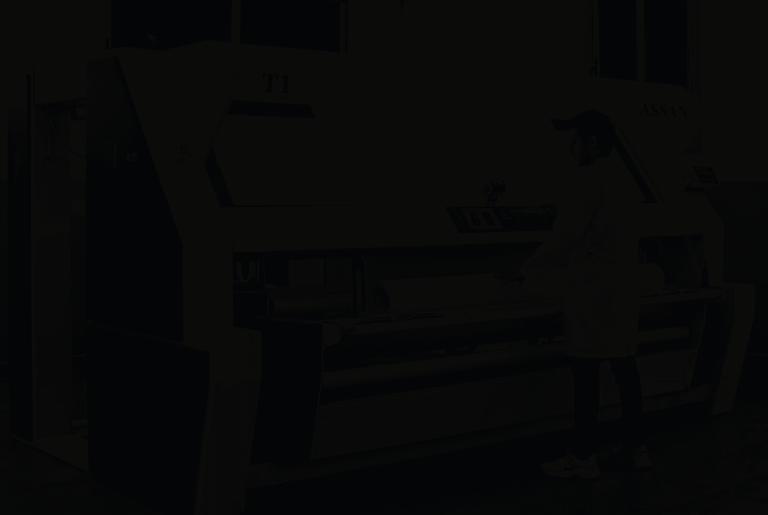 Industrial fabric processing machine.