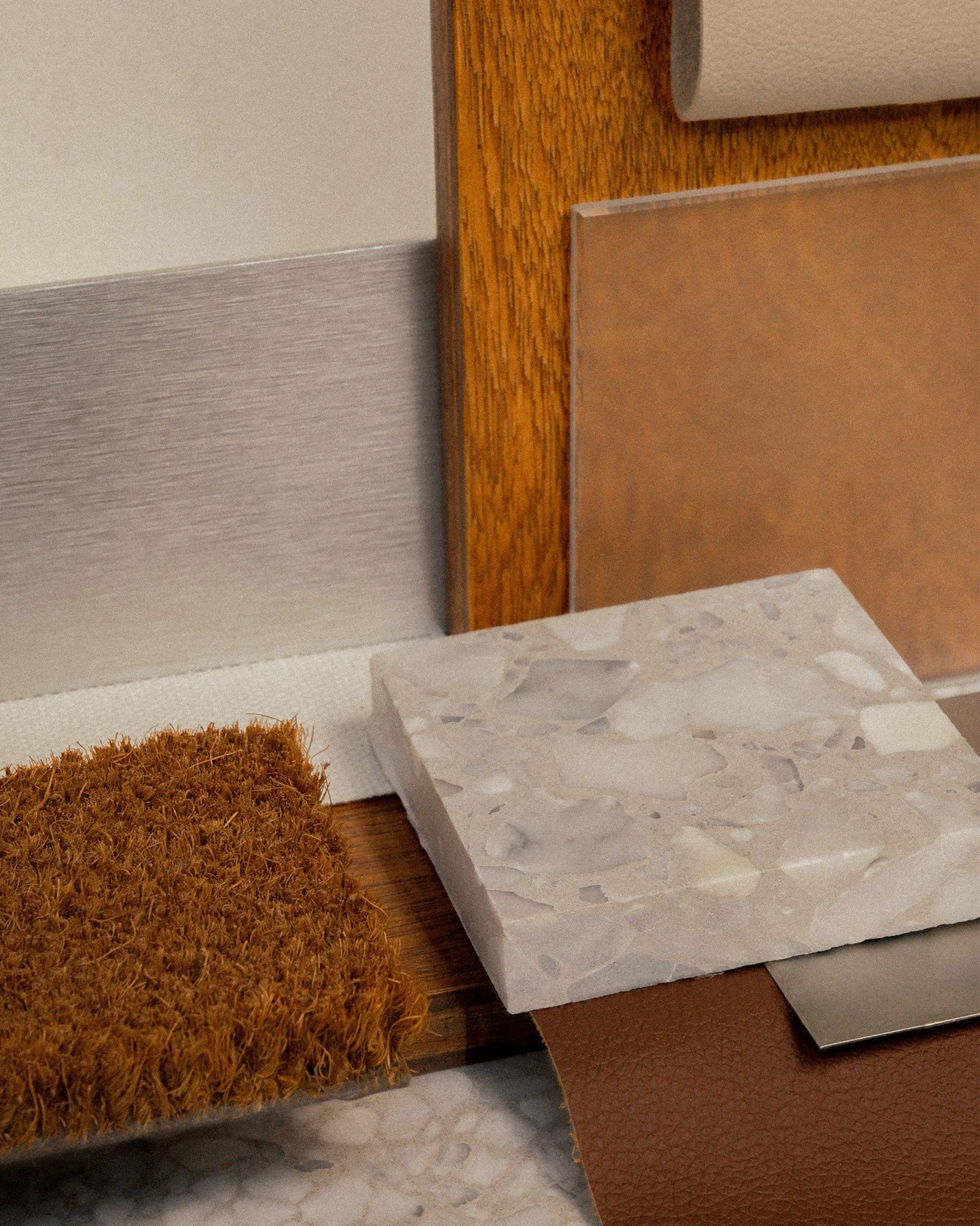 Detail shot of stone countertop meeting wood cabinetry, showcasing texture and craftsmanship.
