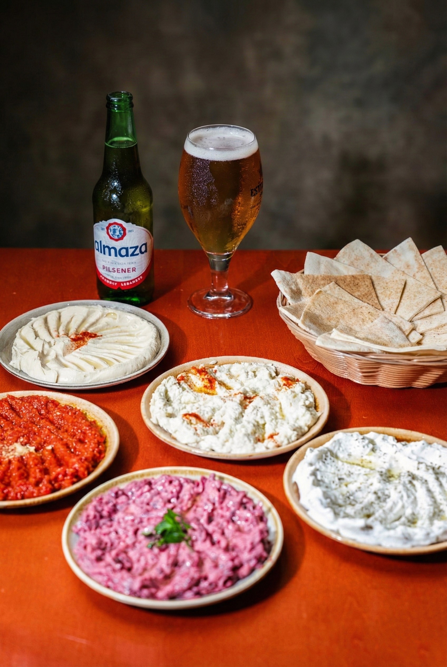 Restaurant exterior with black facade and welcoming atmosphere.