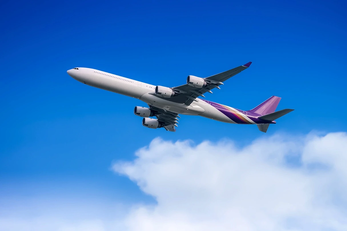 Passenger aircraft in flight used on an aviation accident lawyer page for Stockton cases