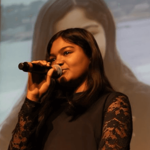 Inaaya Ahmed presenting at a conference