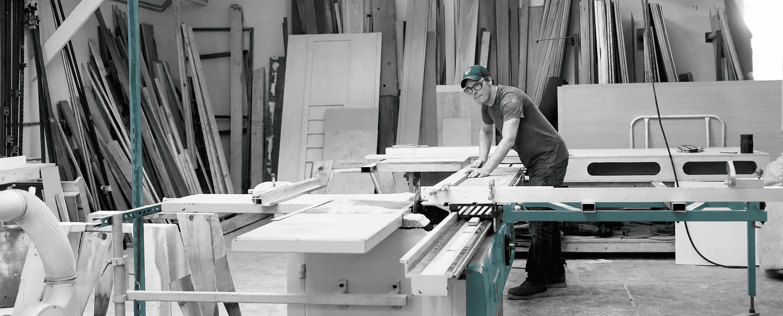 A person working at a fabrication table in the Oakland Digital Foundry.