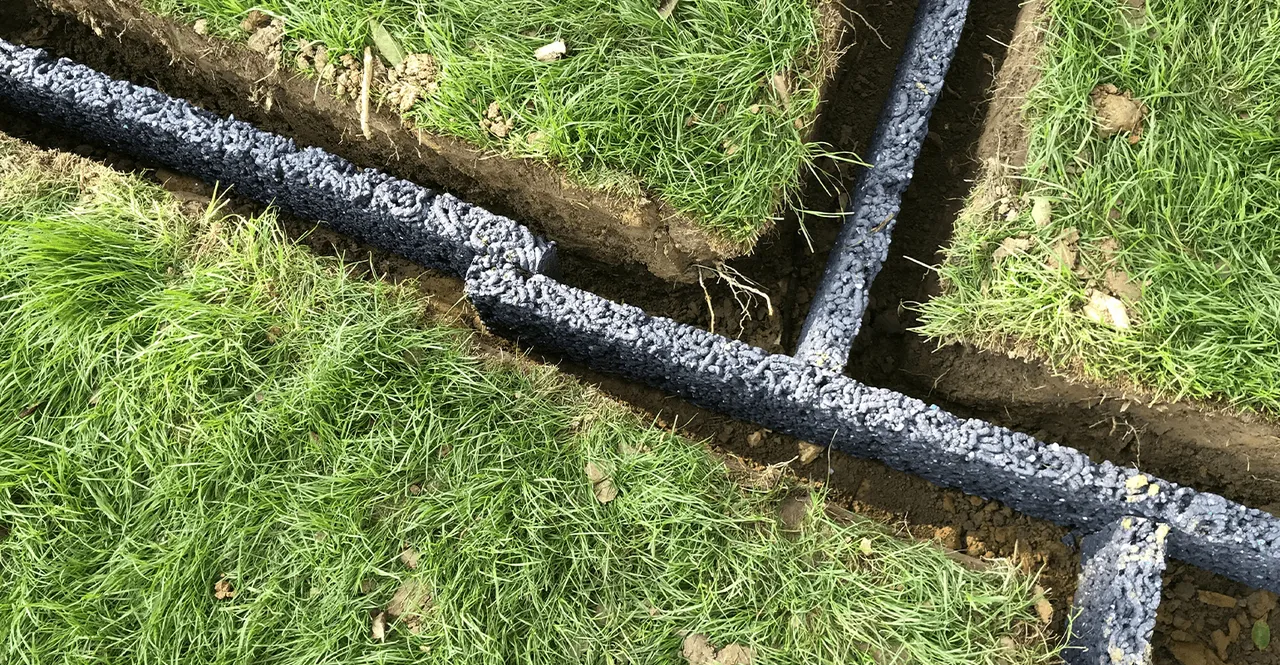 person writing on a piece of paper 