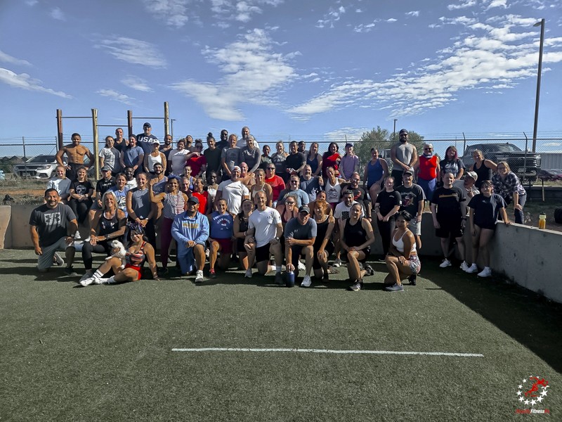 group of people outside gym