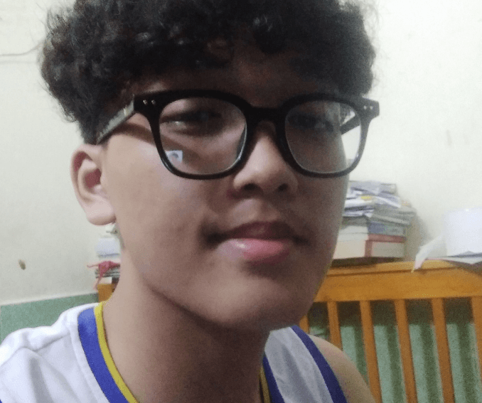 A portrait of a young man smiling