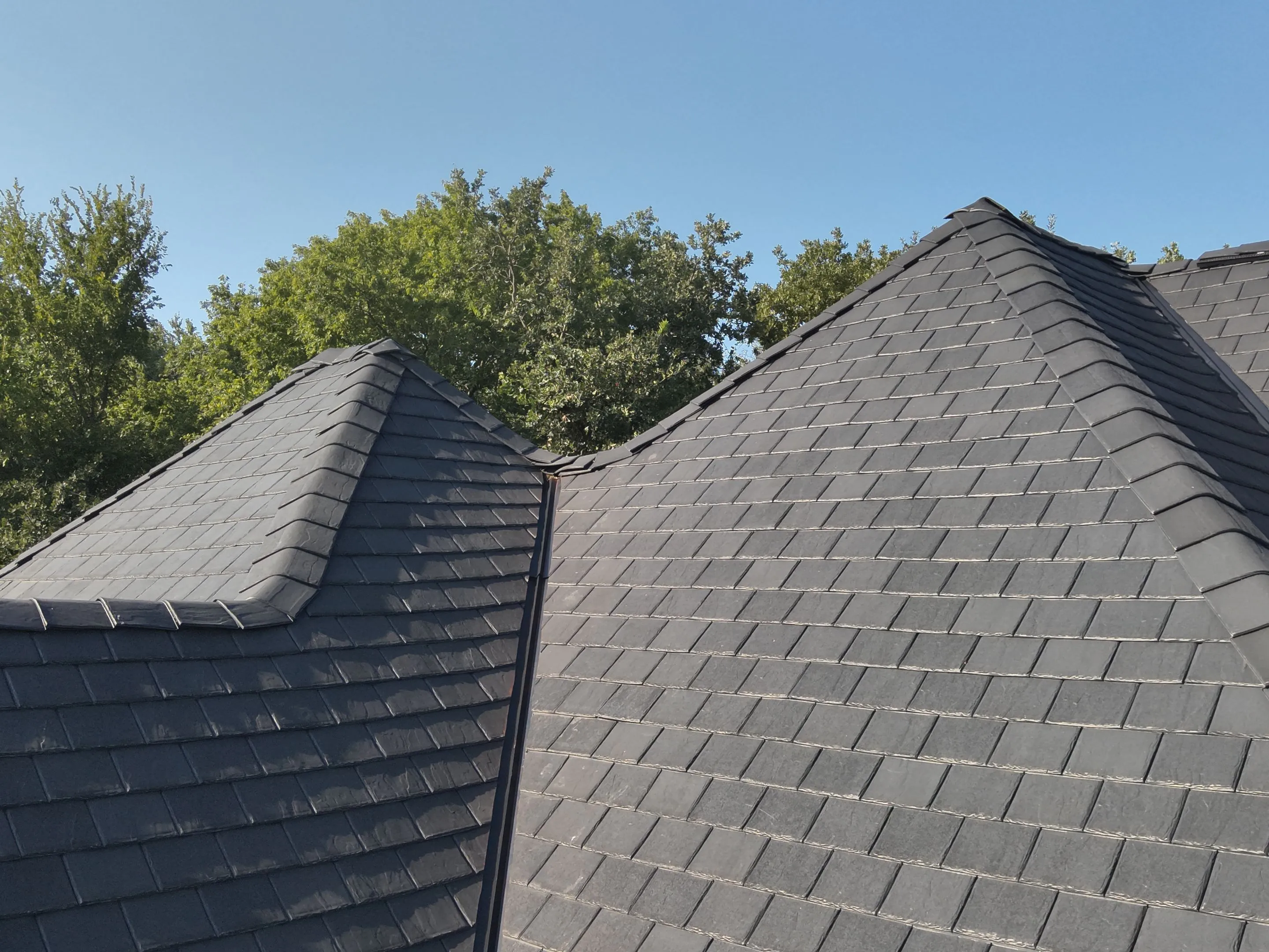 Detailed view of F-Wave synthetic roofing shingle pattern and texture demonstrating superior craftsmanship in Corinth TX