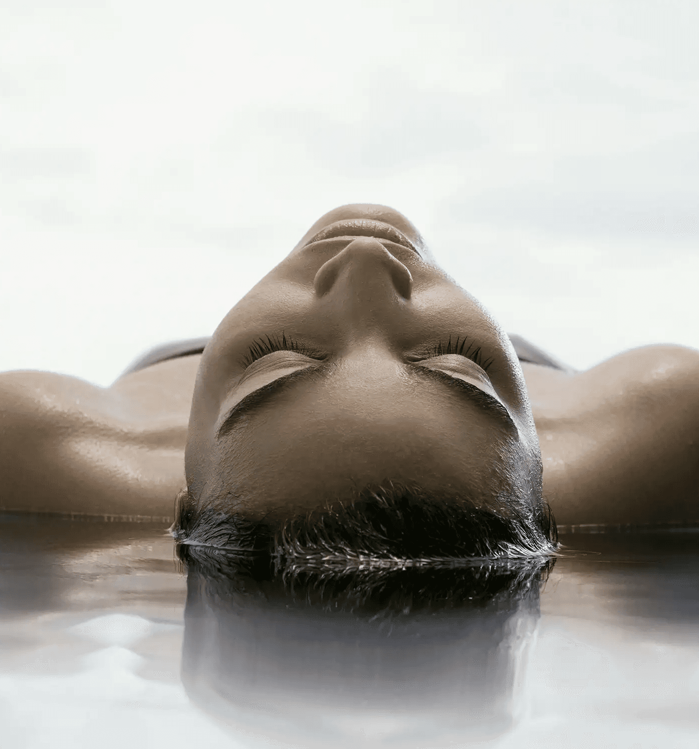 Person Floating In Etherial Water