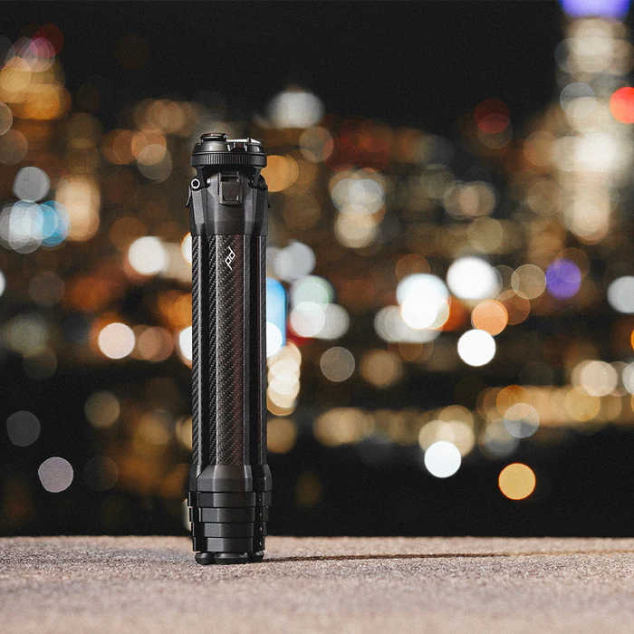 Small tripod standing on concrete in city