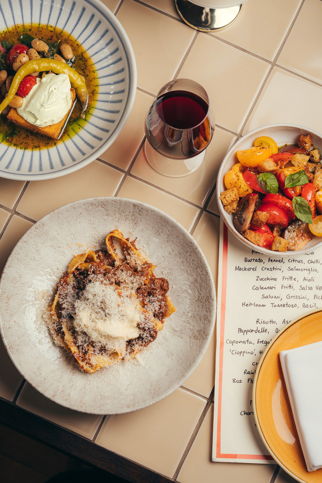 Little Capo restaurant branding, designm and architecture by S+Co. Photography by Stephen Liste