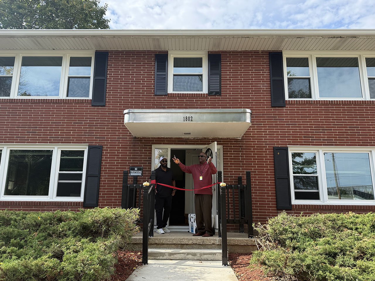 EXPO executive director Jerome Dillard, right, and Dennis Franklin, interim associate director, at the group’s four-unit apartment building on Axel Avenue. Credit: Isthmus