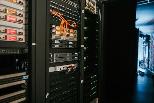 a rack of servers in a server room