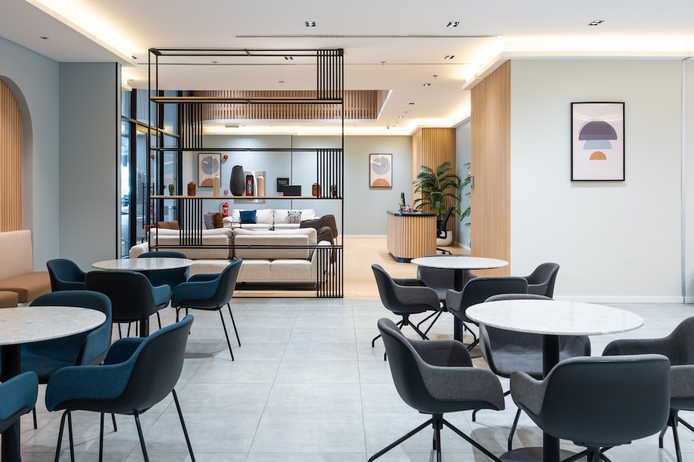 Café seating area at DIOM Century Corner Ground Floor headquarters in Riyadh