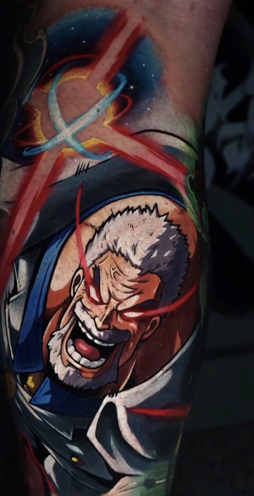 Dynamic tattoo of Monkey D. Garp from One Piece, featuring a galaxy impact effect with bold colors by Troy Slack