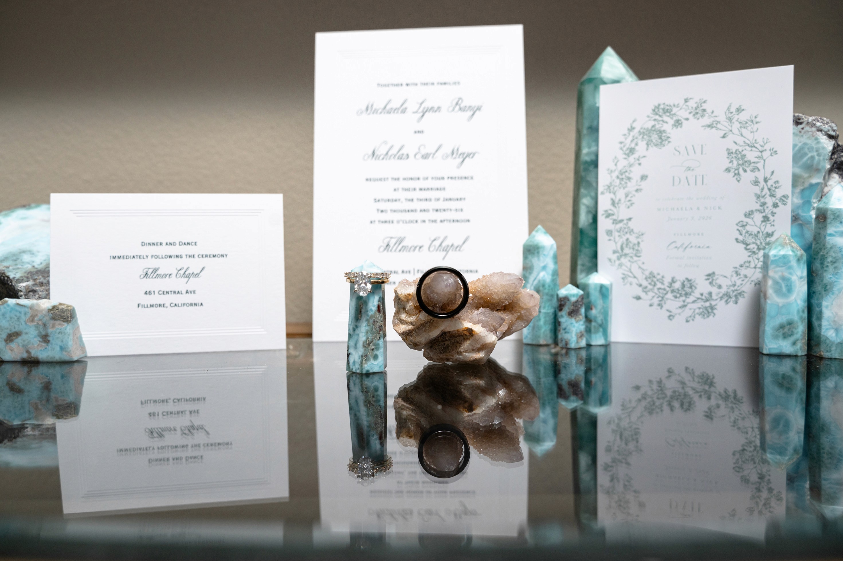 Flat lay wedding details with bouquet, rings, and sparkling bridal heels