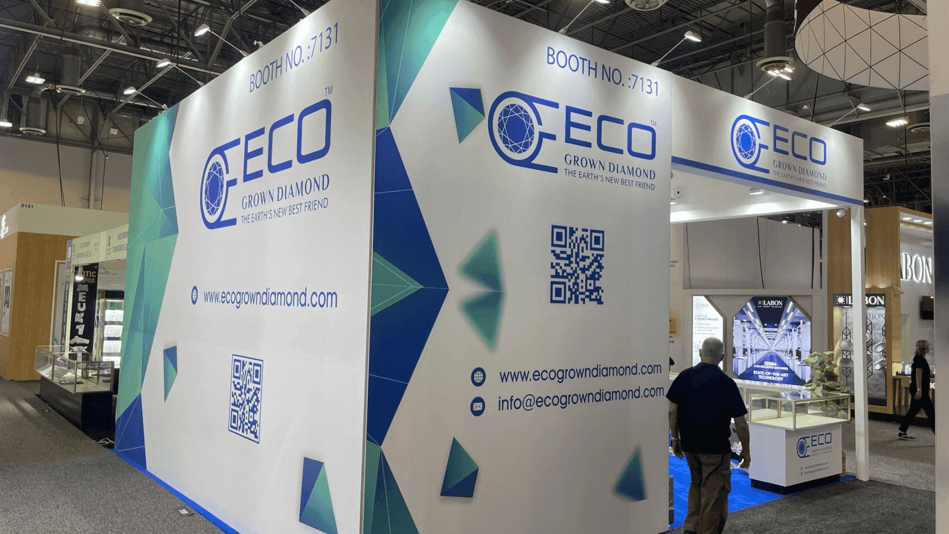 luxury jewelry booth with secure display case setup and refined merchandising presentation for retail buyers