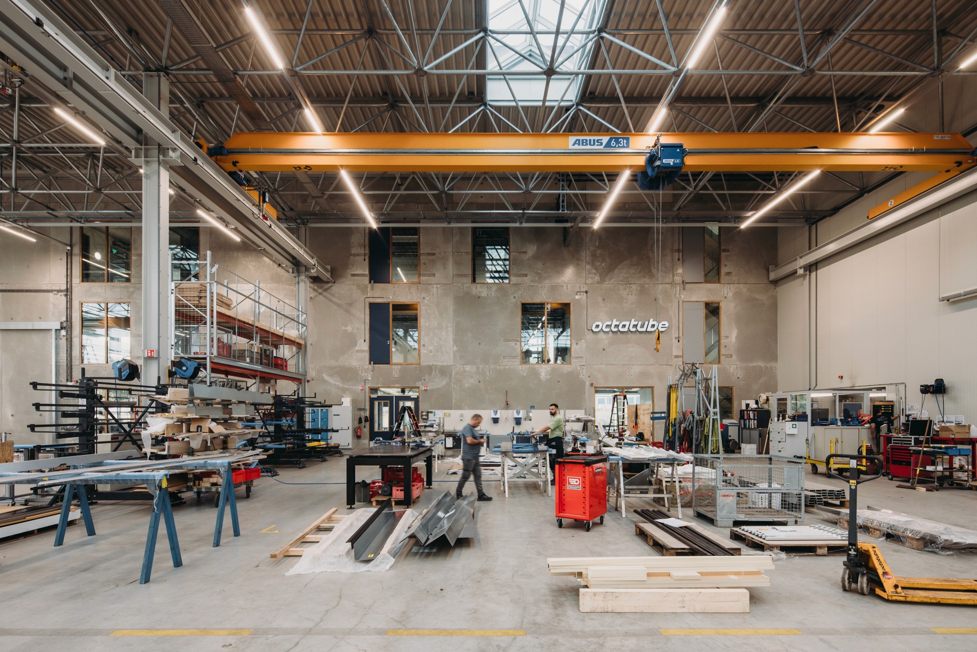 Interior photo of the main production hall, looking towards the offices