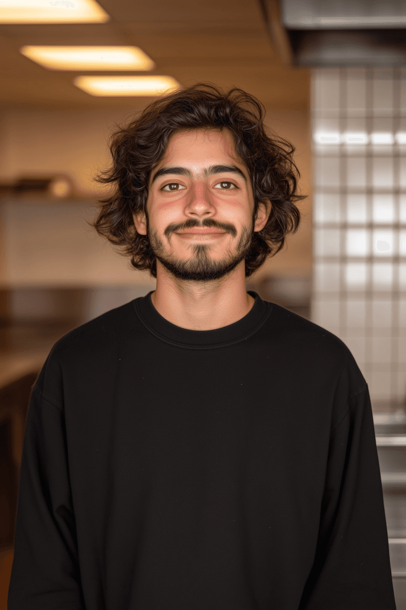 Smiling man in beige shirt with soft natural light portrait