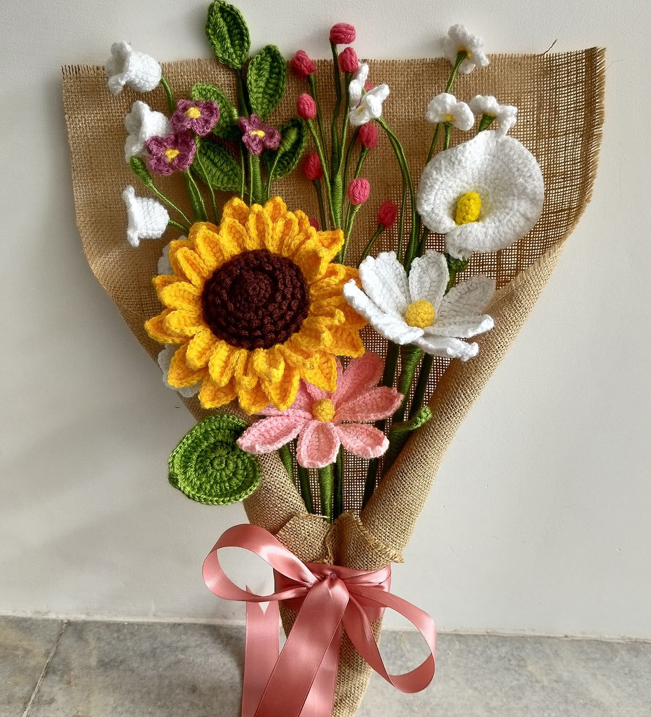 Handmade crochet mixed flower bouquet wrapped in jute fabric
