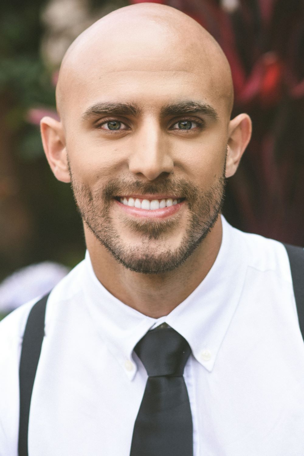 Portrait of a smiling man in a shirt and tie