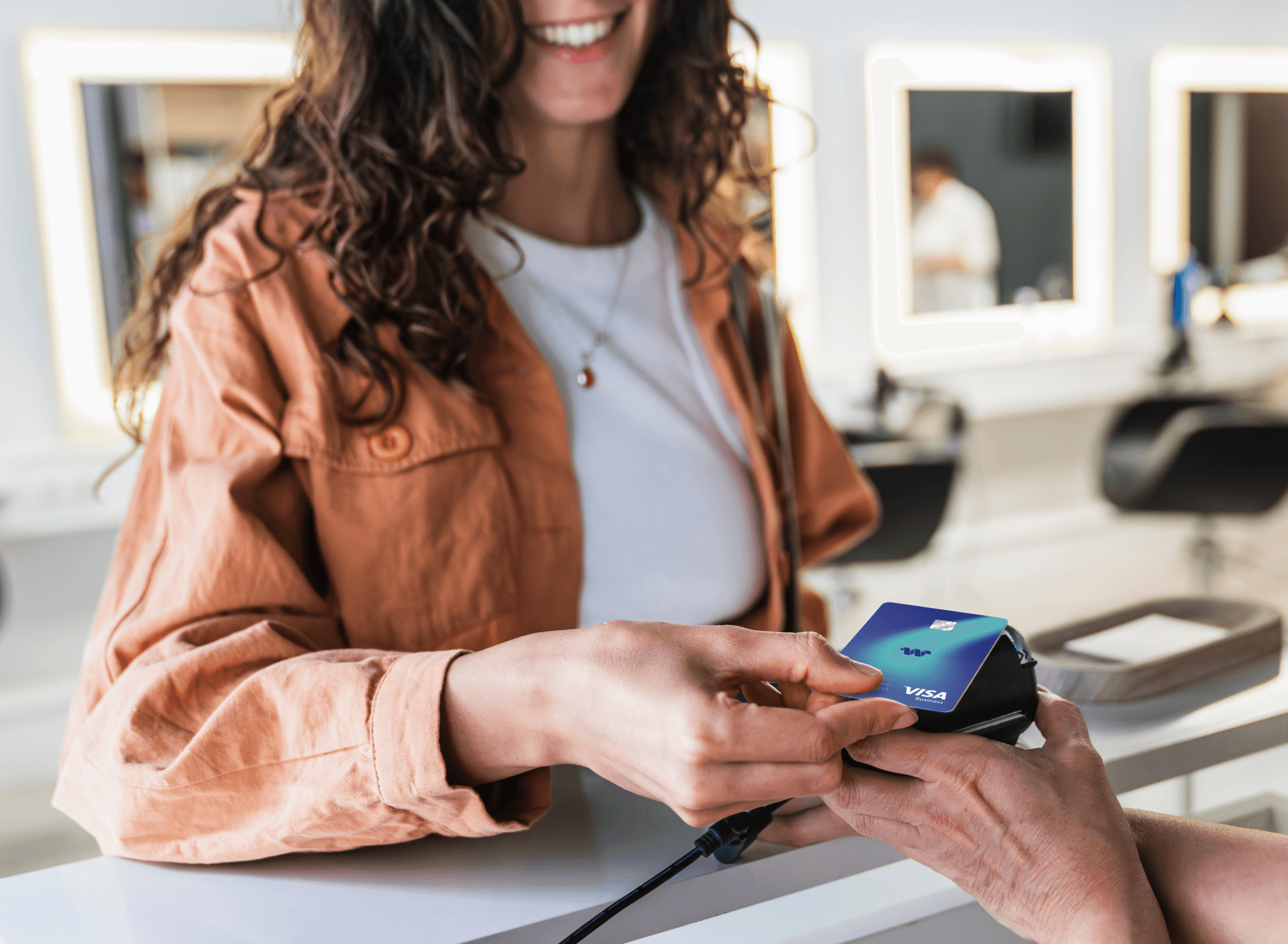 Woman holding a smartphone looking through the glass 