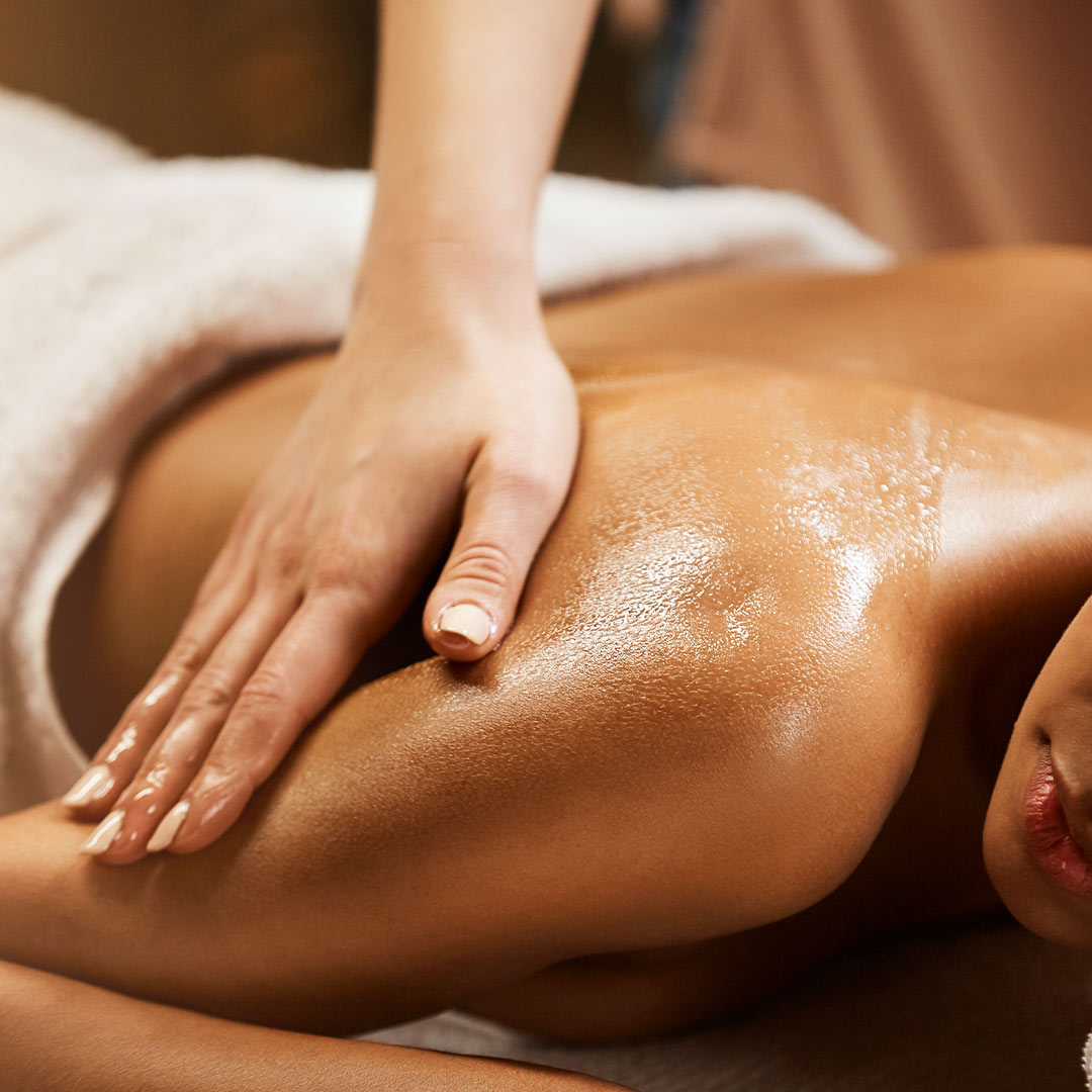 Therapist using cupping tool on back