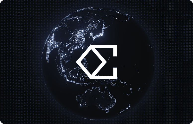 A red hot air balloon glows at sunset over mountains.