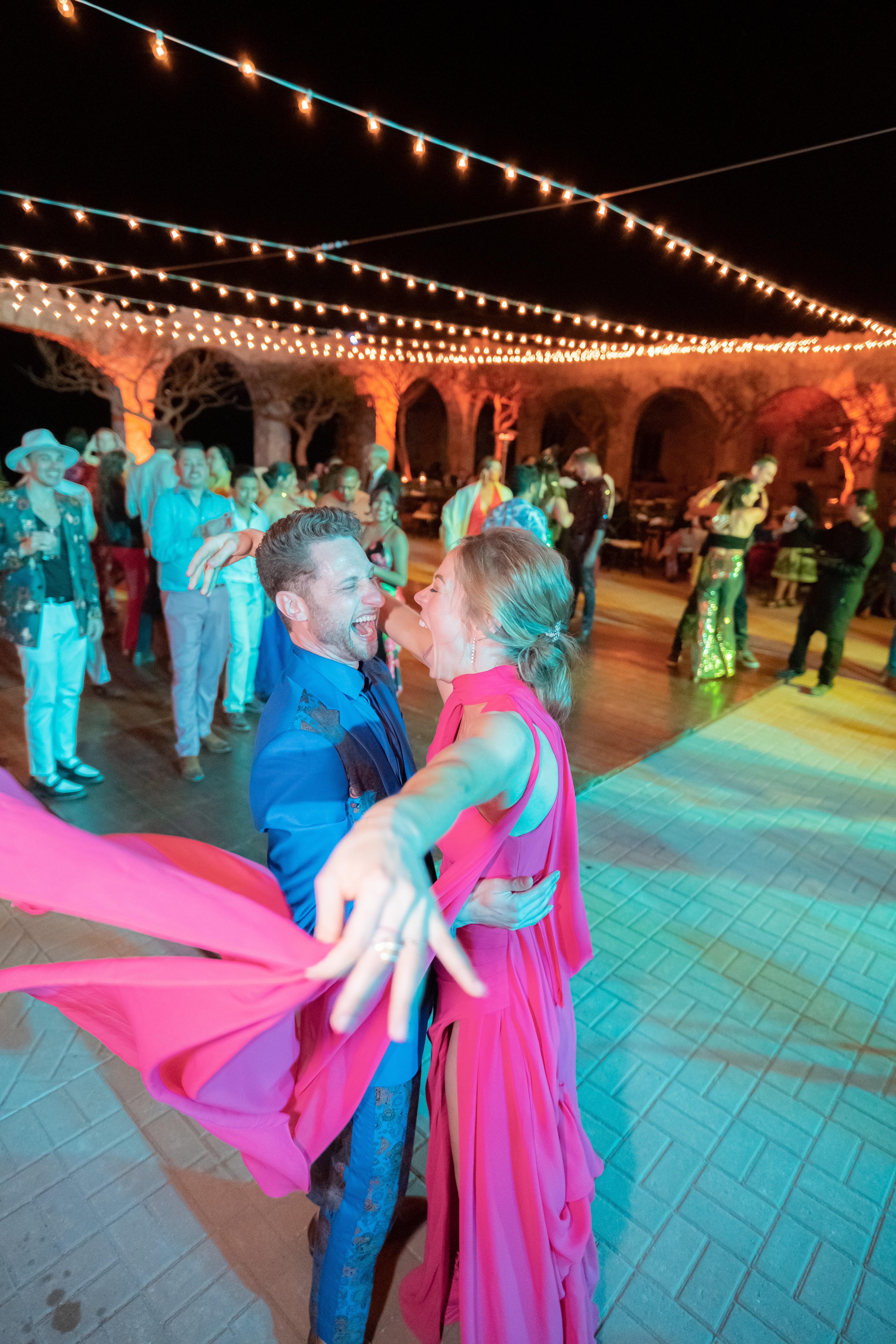 Bride and groom kiss in a destination wedding in los cabos 