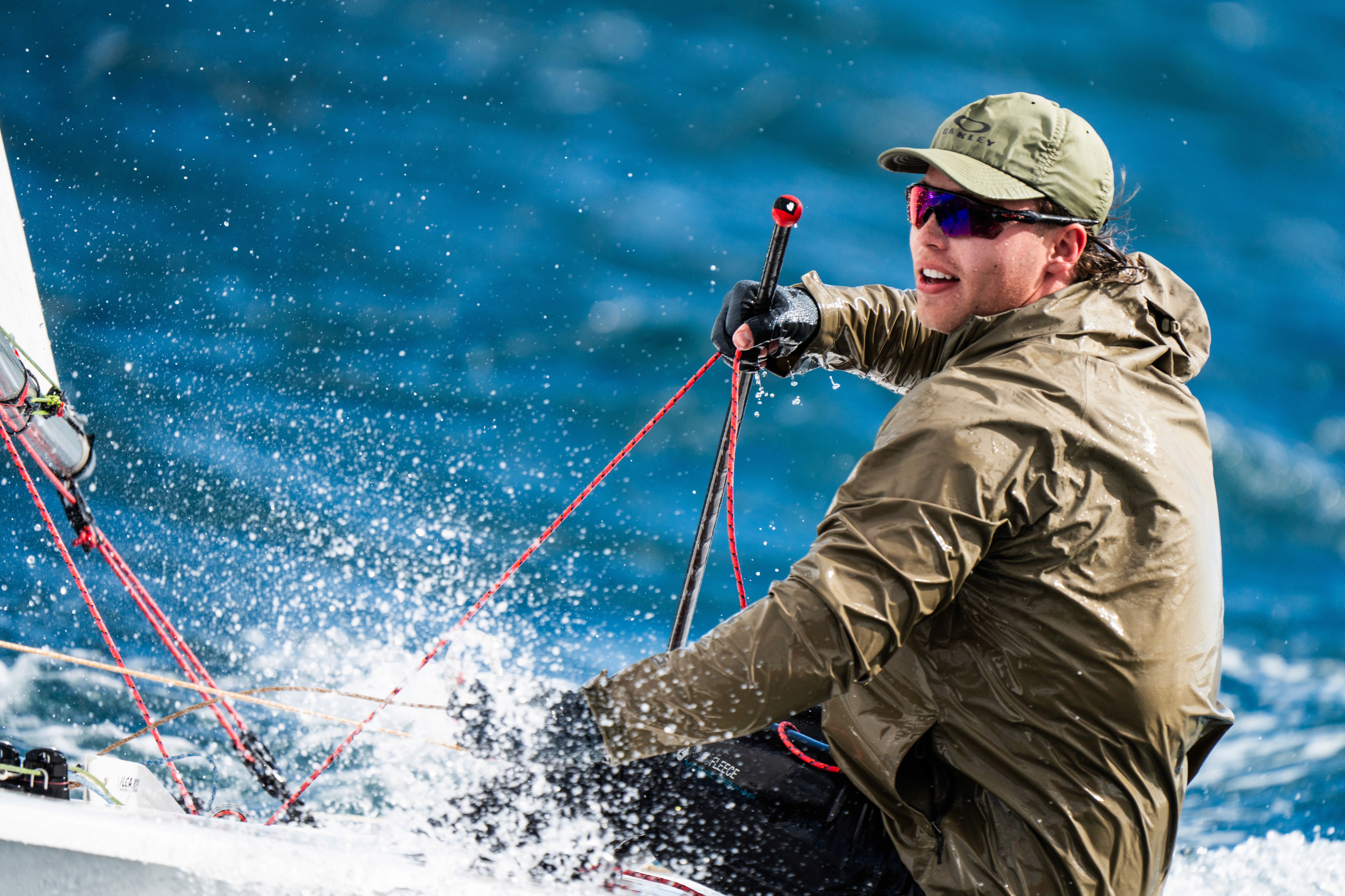 A man wearing a virtual reality headset, immersed in a digital experience, with a focused expression on her face.