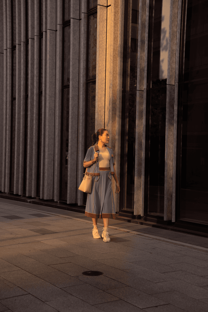 Model posing with the sunset hitting