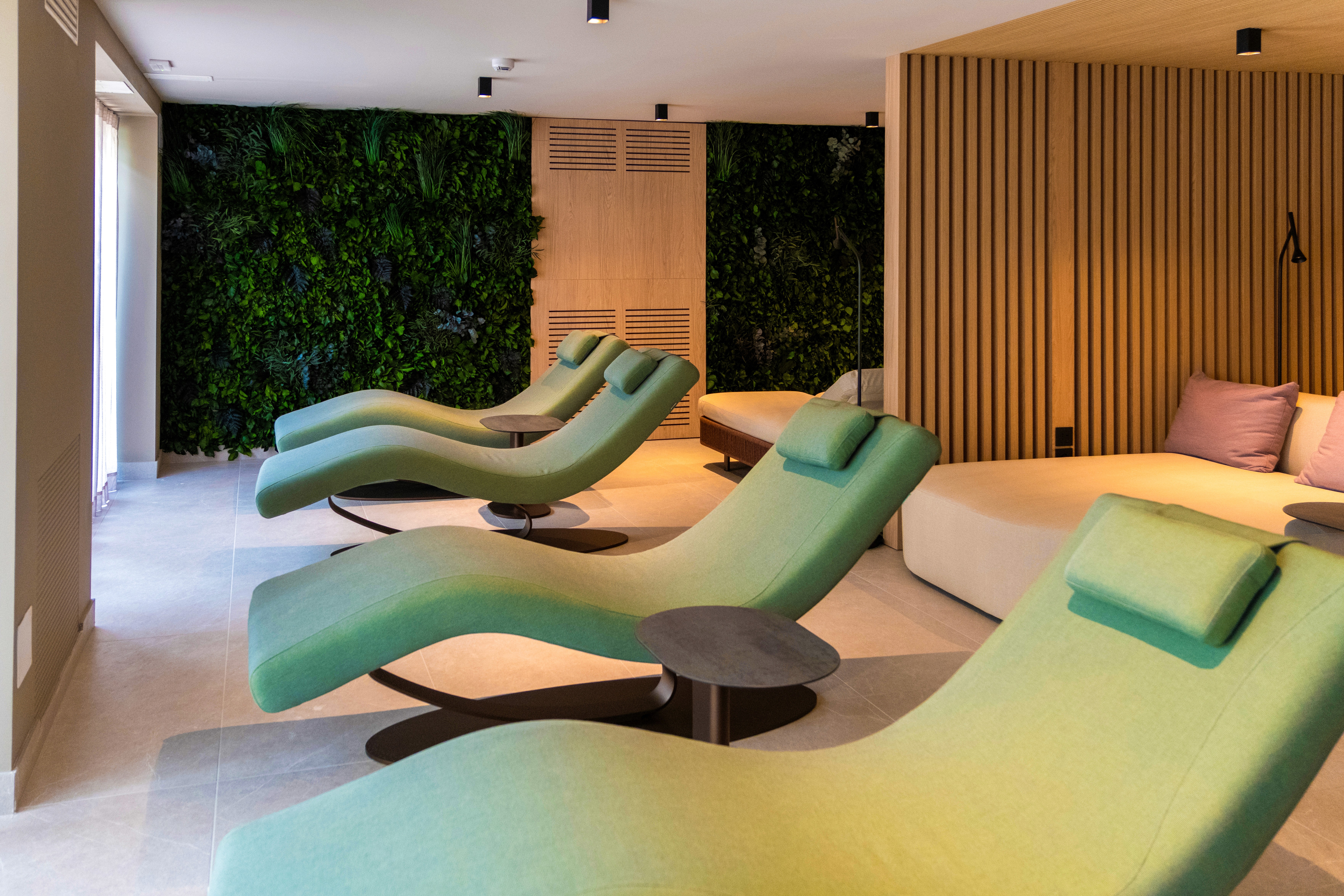 A smiling woman throwing a basketball