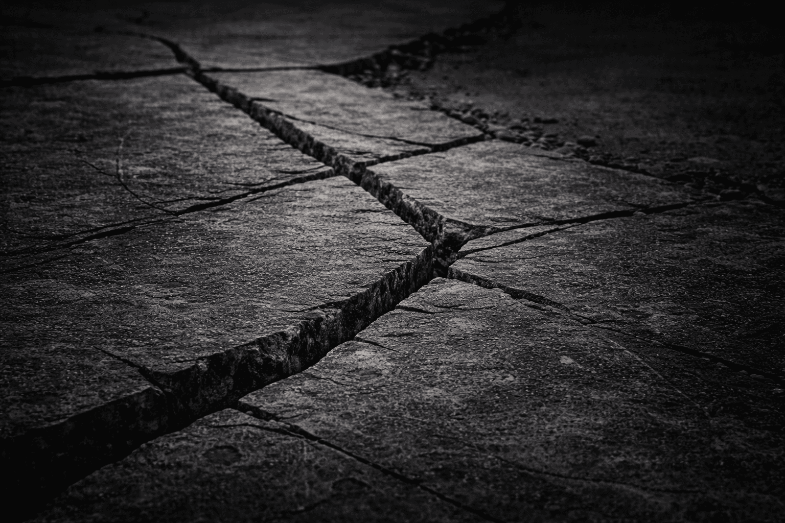 person pointing white paper on wall