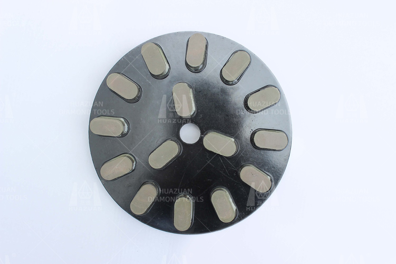 Close-up of a black Metal/Resin Bond Grinding Disc showing the grinding segments.