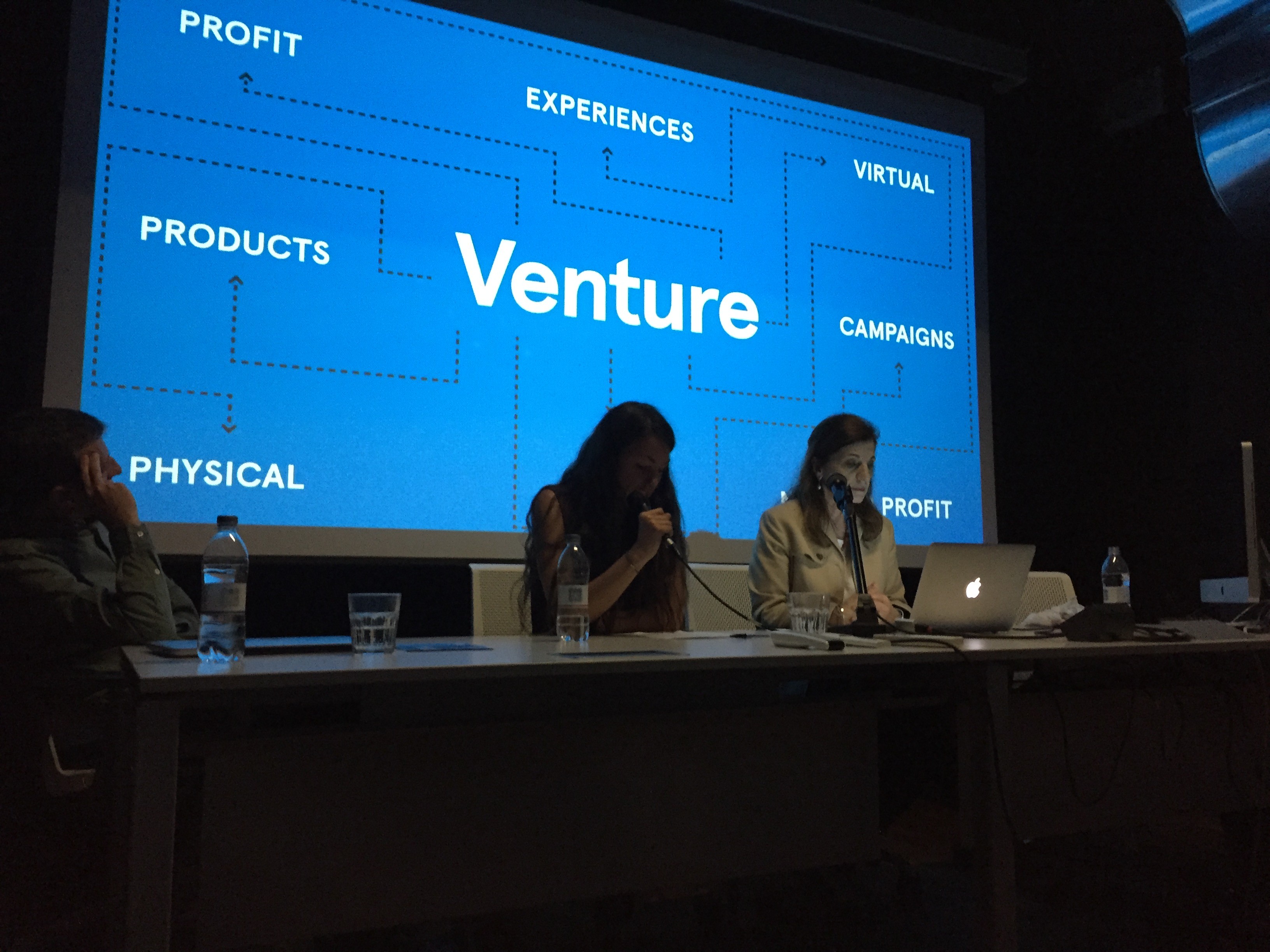 two women making presentations