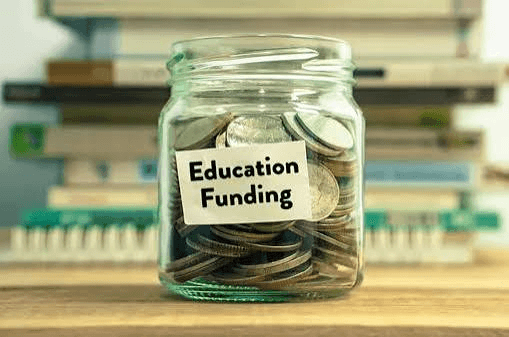 High school student presenting a research funding proposal to a school administrator at a desk