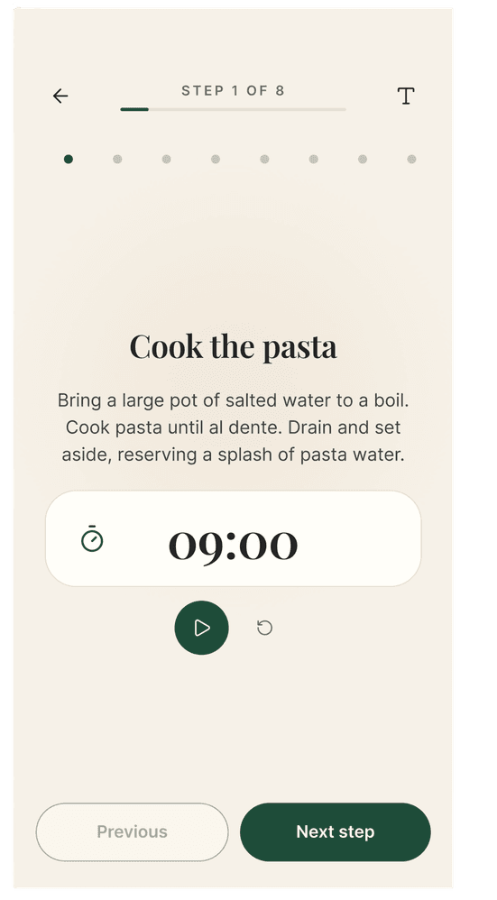 Refined Cook Mode screen with text-size control, step 1 of 8 progress, a large nine-minute timer with reset, and previous and next step buttons.