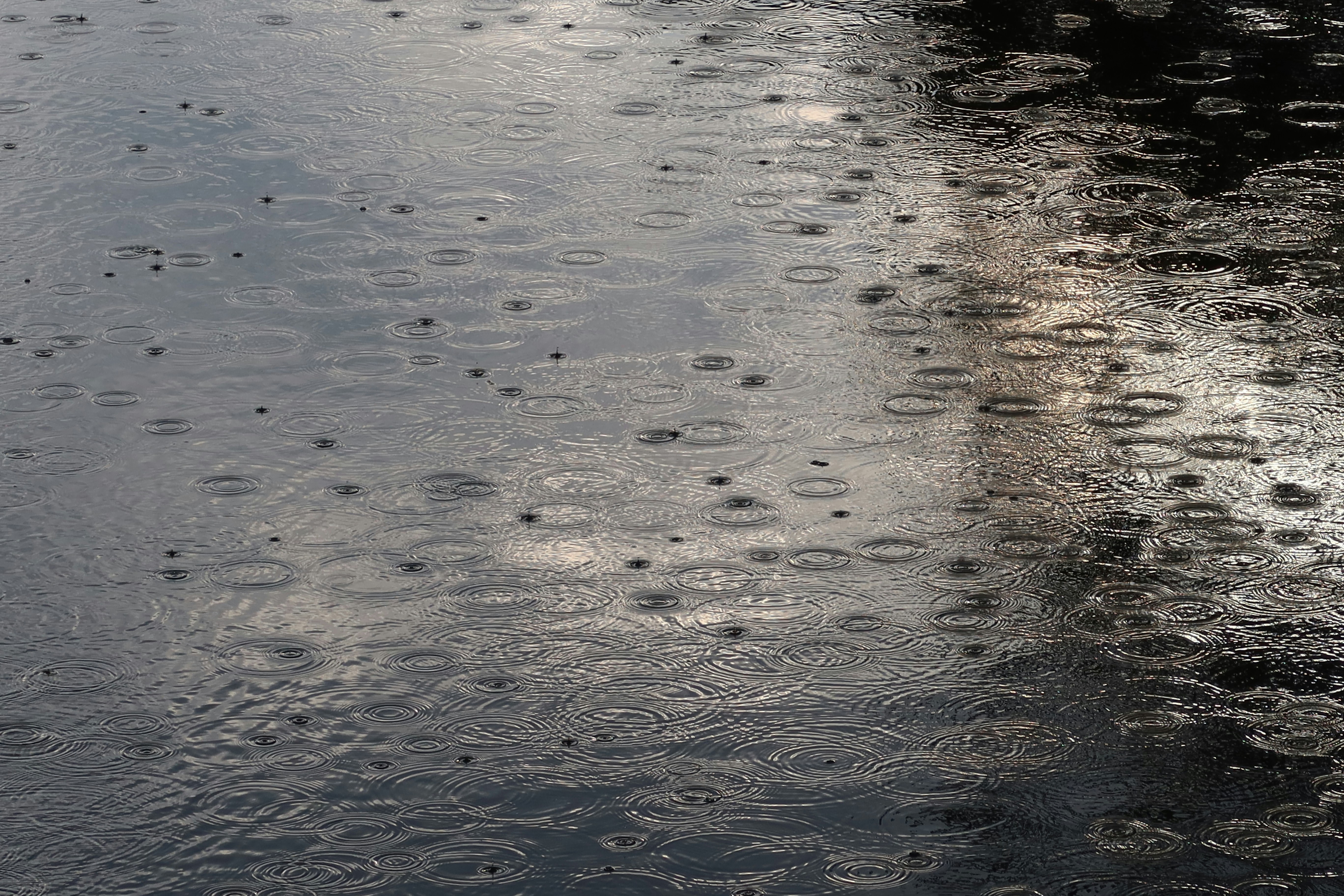 a wet surface with ripples