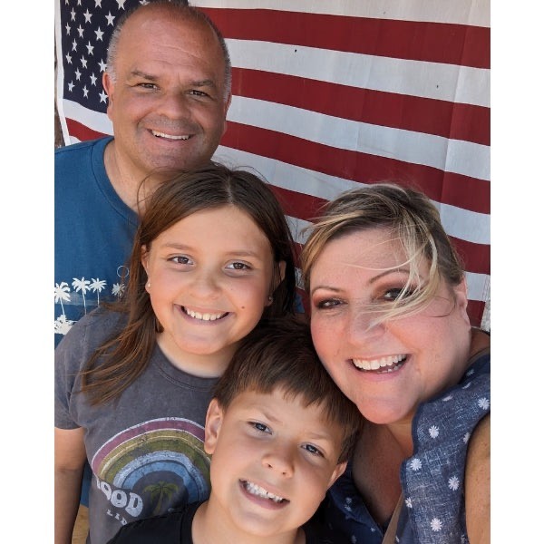 Family Photo in front of USA Flag