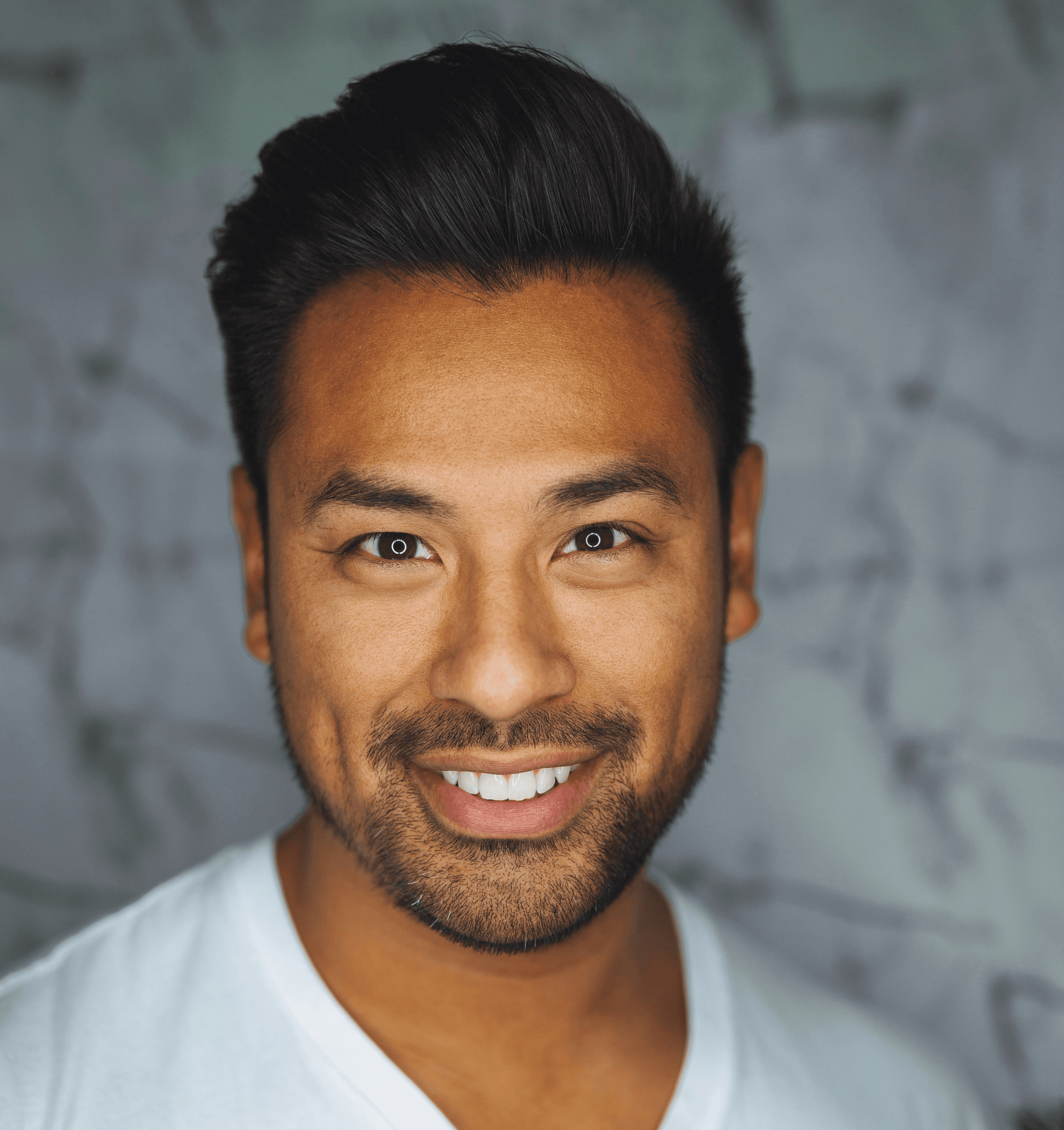 man wearing white V-neck shirt