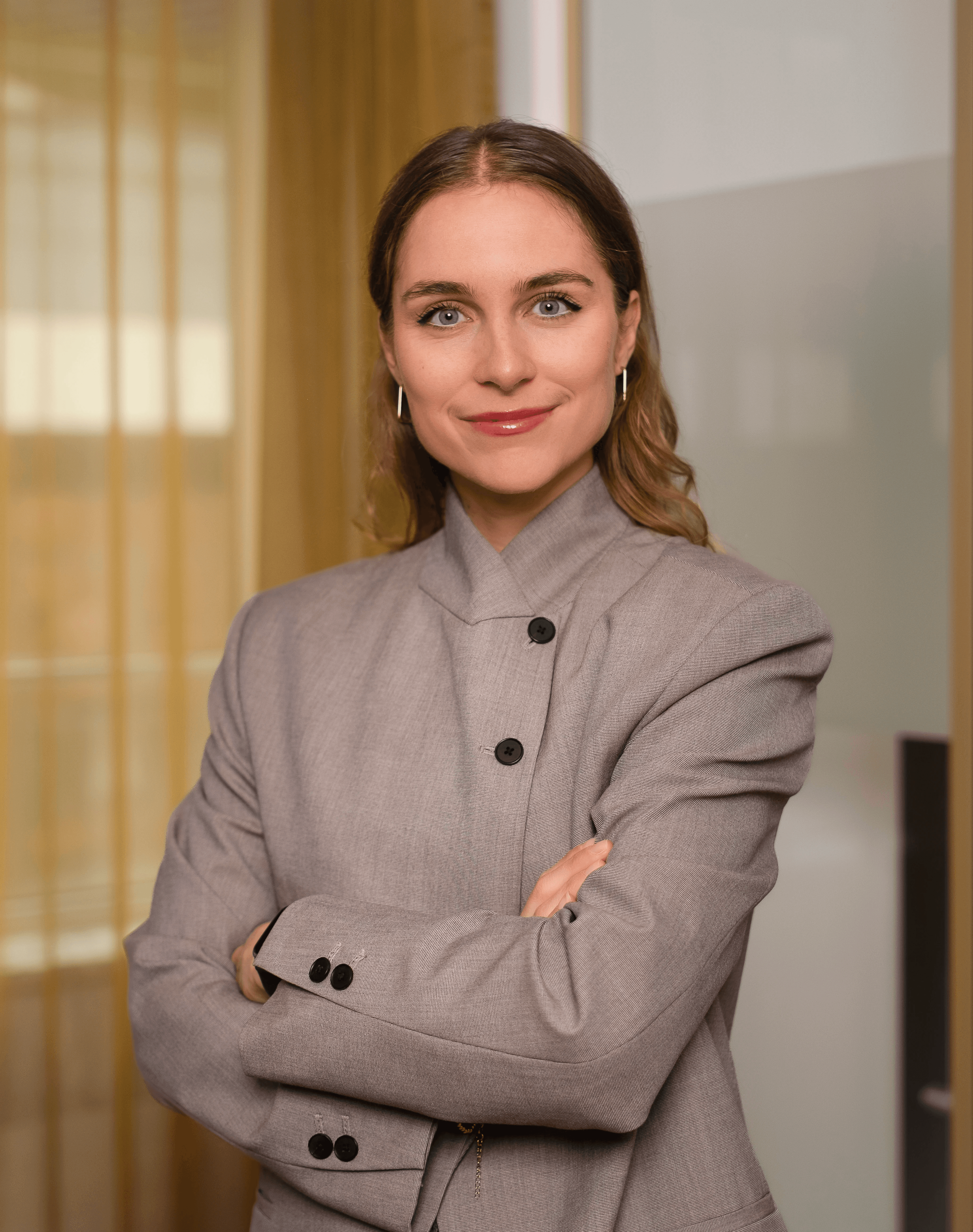 Portrait of a person in dark clothing speaking on a phone