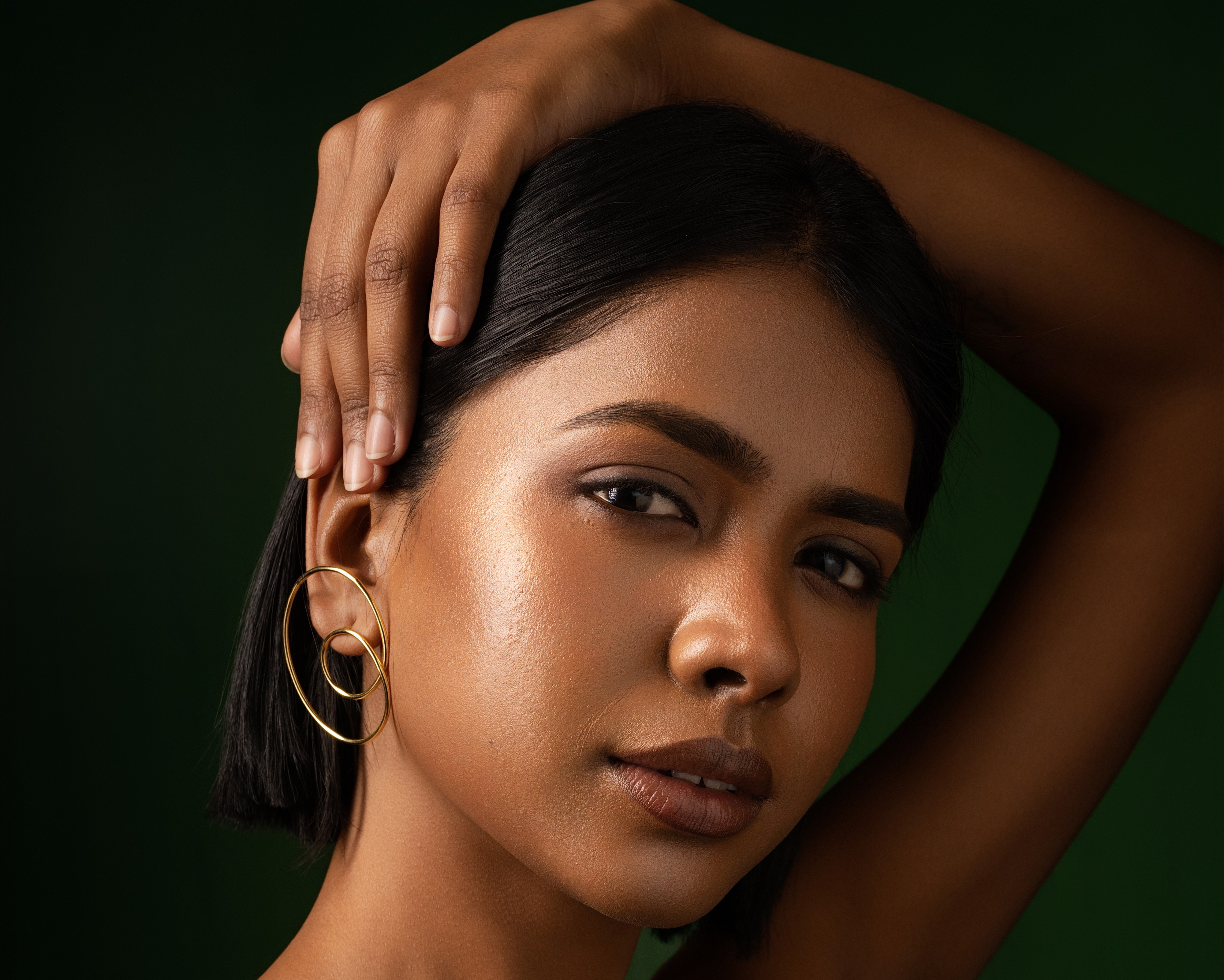 a woman holding a red flower