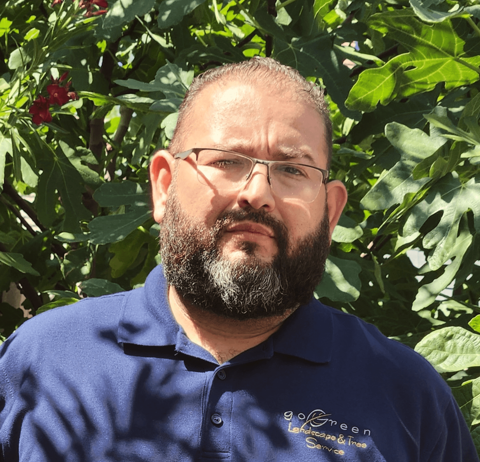 man standing beside wall