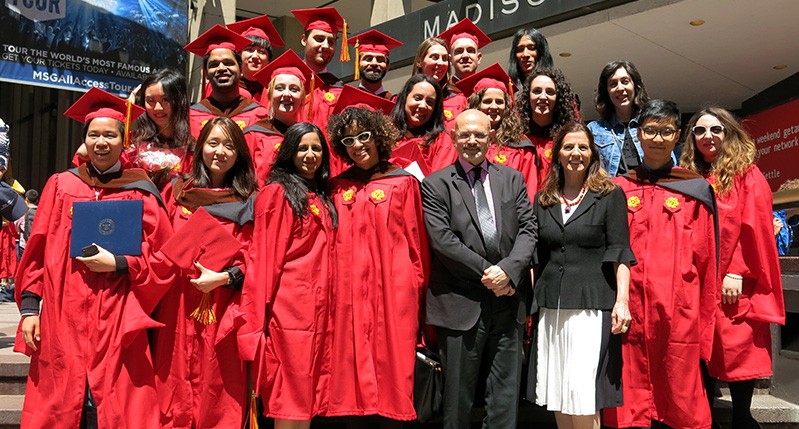 a red gown graduation with steve and lita