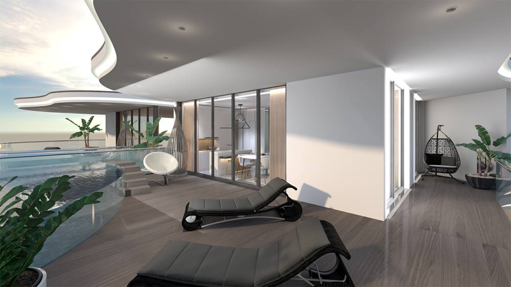 A modern balcony with lounge chairs overlooking the ocean at Samana Santorini.